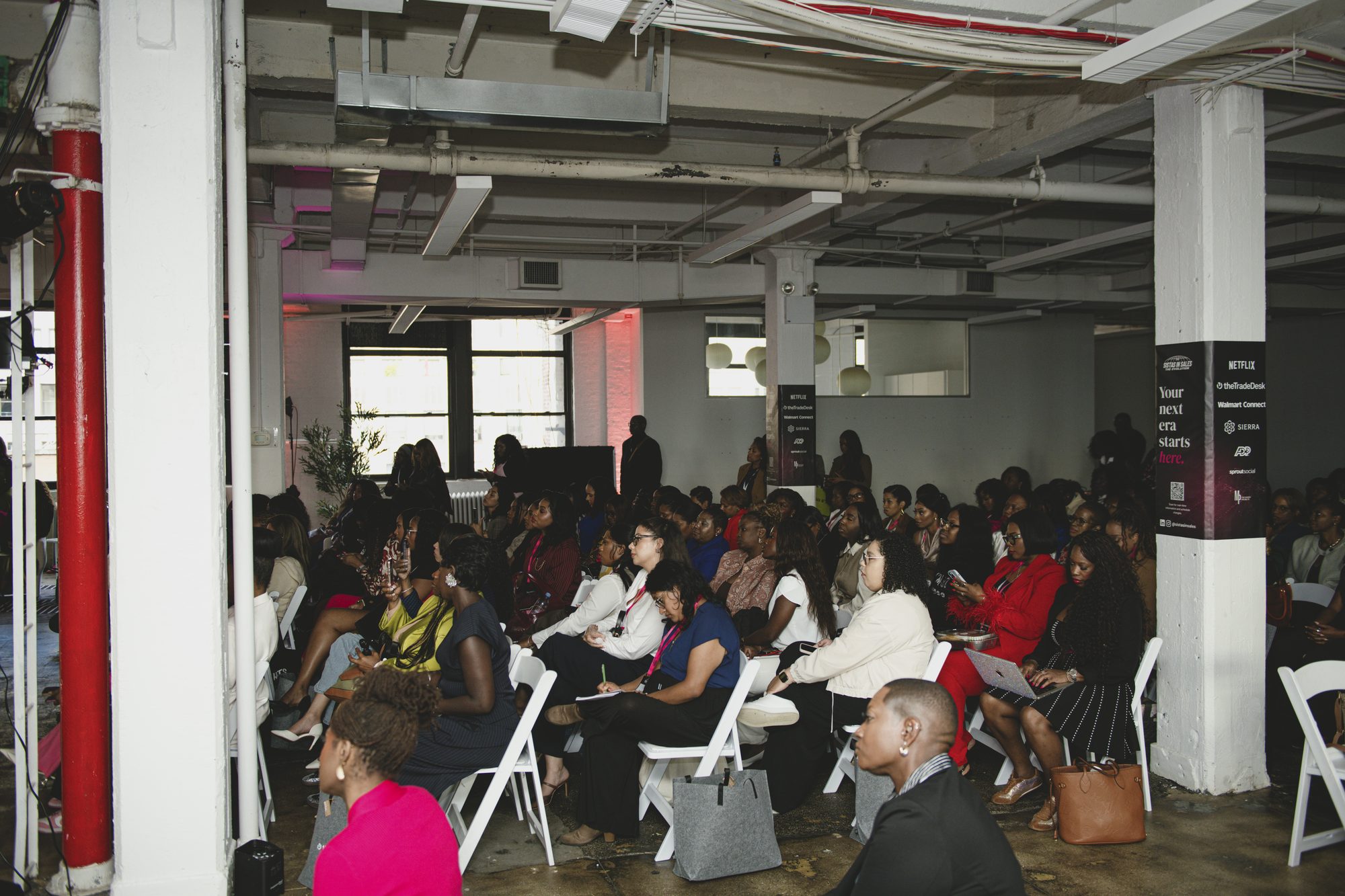 Packed audience seated throughout the 2026 SIS Summit venue