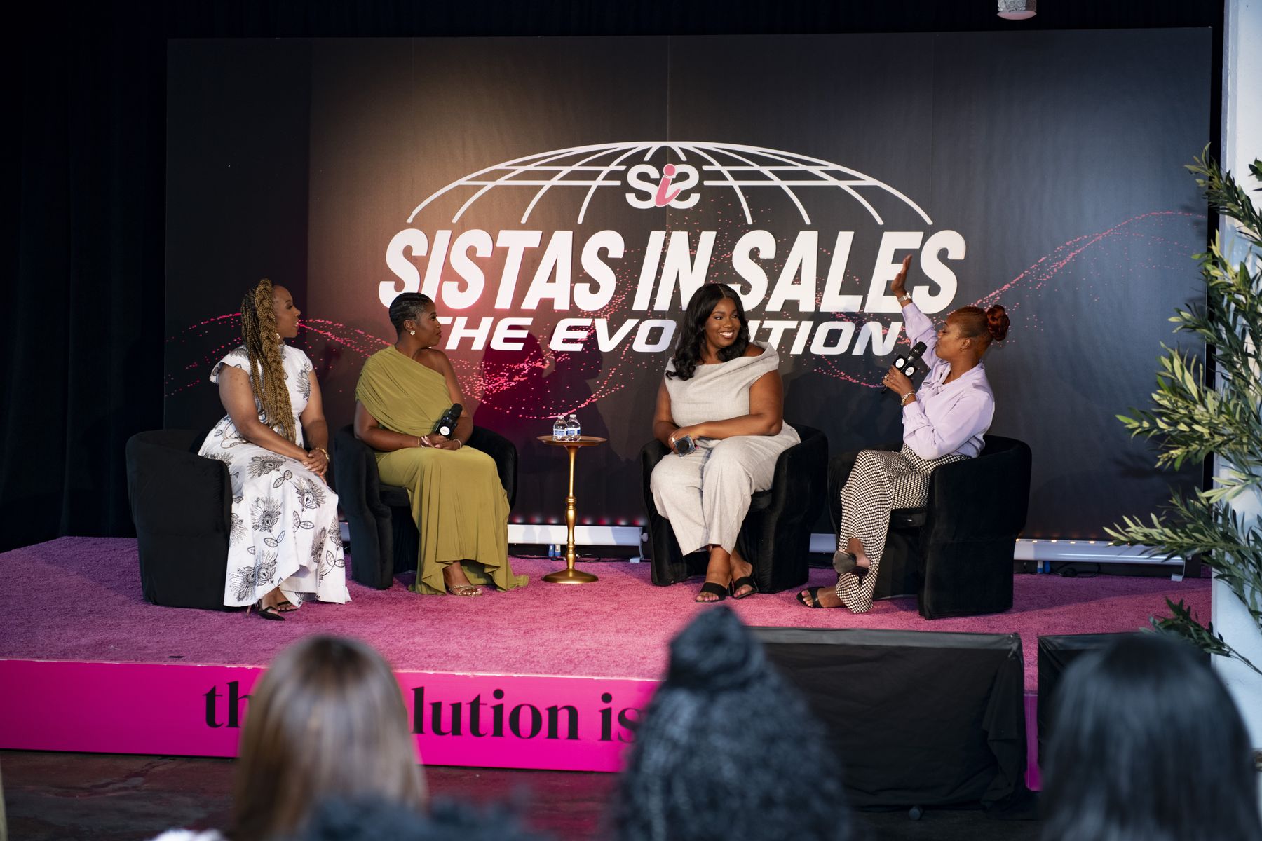 Speakers on the Frontier stage during 'The State of Sistas in Sales'