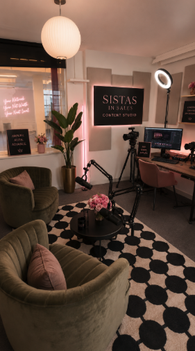 SIS Content Studio with seating, lighting, and recording setup