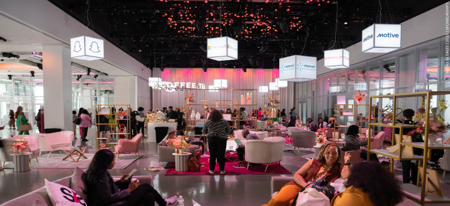 The SIS Bistro Expo floor with branded sponsor lounges from Walmart, Oracle, Snapchat, and Motive
