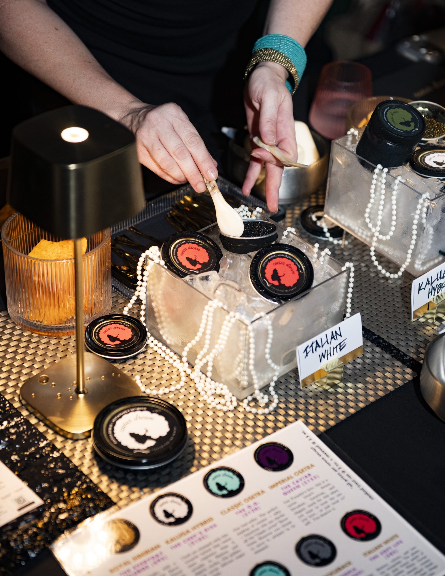 Beauty station with tins of product and a printed shade guide