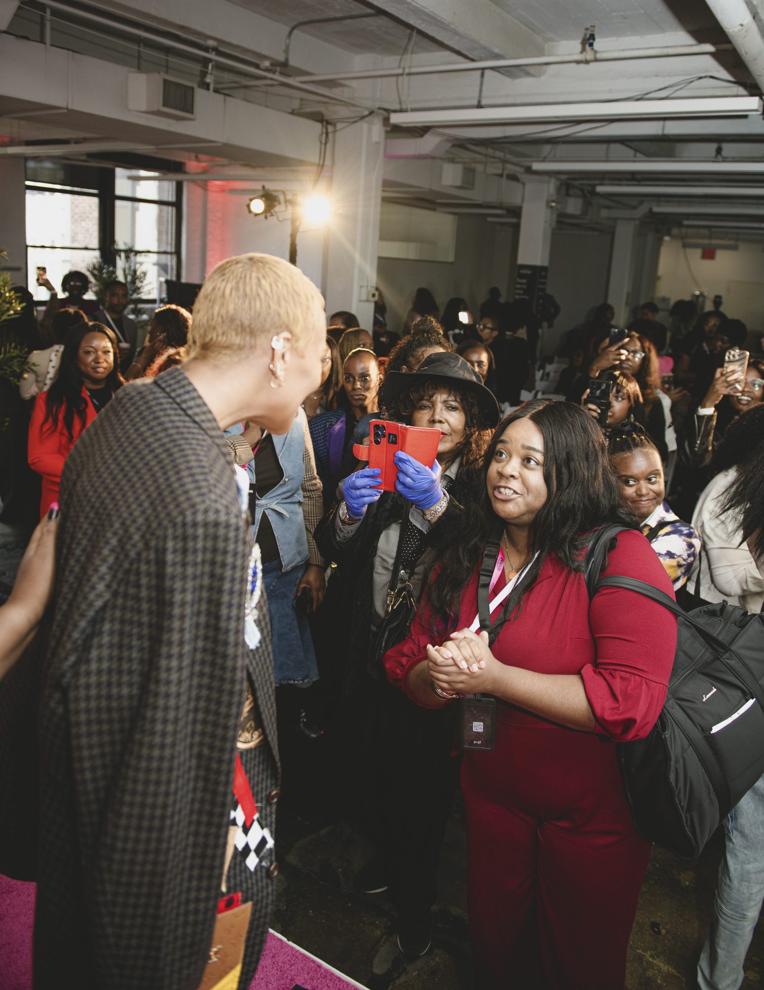 Attendees gathering and talking in the crowd at the 2026 SIS Summit