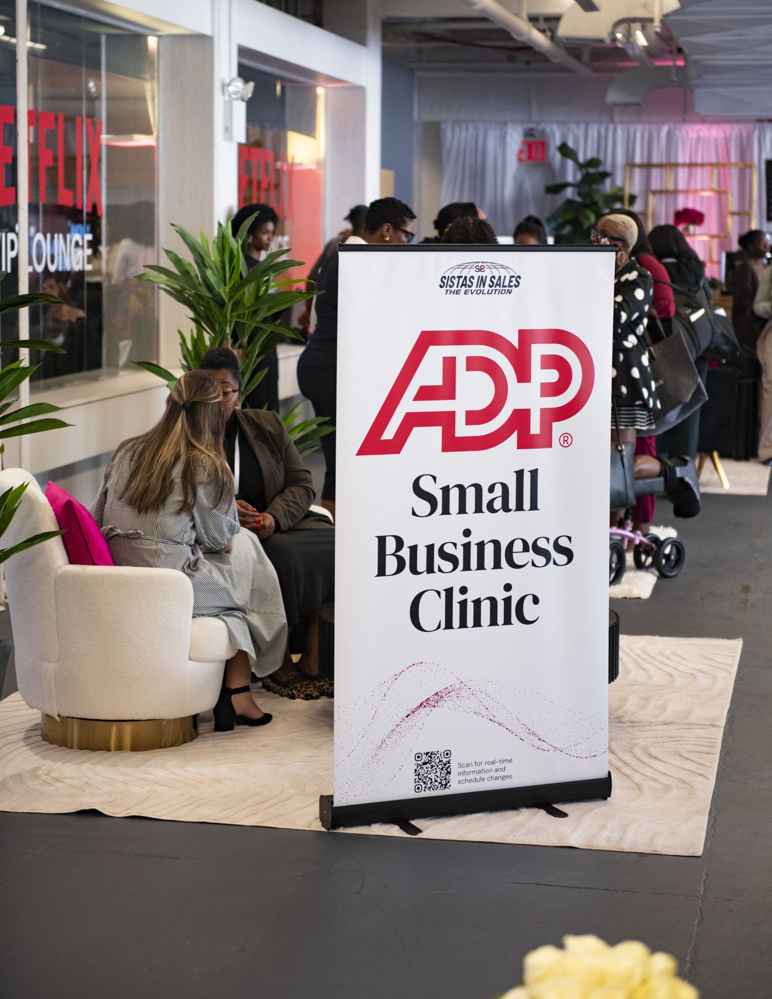 Attendees in conversation at the ADP Small Business Clinic
